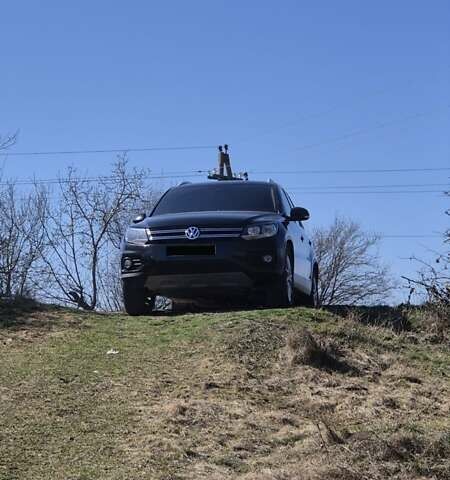 Чорний Фольксваген Тігуан, об'ємом двигуна 1.98 л та пробігом 180 тис. км за 14000 $, фото 23 на Automoto.ua