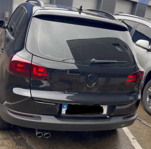 Черный Фольксваген Тигуан, объемом двигателя 2 л и пробегом 181 тыс. км за 11350 $, фото 1 на Automoto.ua