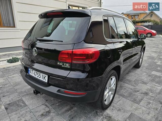 Чорний Фольксваген Тігуан, об'ємом двигуна 2 л та пробігом 169 тис. км за 13550 $, фото 2 на Automoto.ua