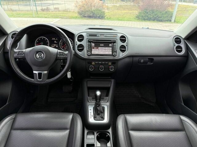 Чорний Фольксваген Тігуан, об'ємом двигуна 2 л та пробігом 145 тис. км за 12650 $, фото 12 на Automoto.ua