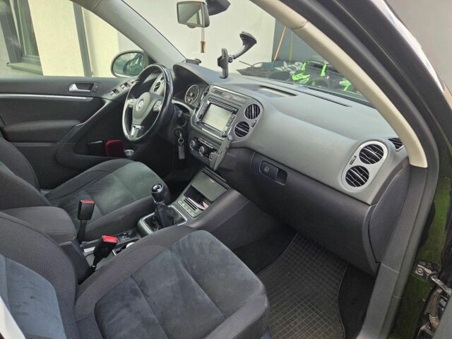 Черный Фольксваген Тигуан, объемом двигателя 1.4 л и пробегом 170 тыс. км за 8650 $, фото 17 на Automoto.ua