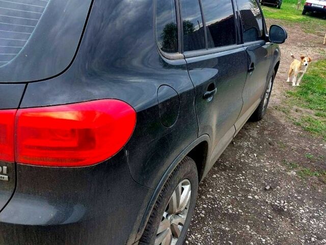 Черный Фольксваген Тигуан, объемом двигателя 2 л и пробегом 340 тыс. км за 14500 $, фото 4 на Automoto.ua