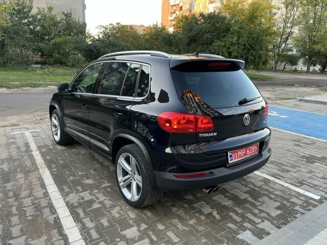 Черный Фольксваген Тигуан, объемом двигателя 2 л и пробегом 140 тыс. км за 13500 $, фото 4 на Automoto.ua