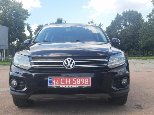 Черный Фольксваген Тигуан, объемом двигателя 2 л и пробегом 224 тыс. км за 11500 $, фото 1 на Automoto.ua