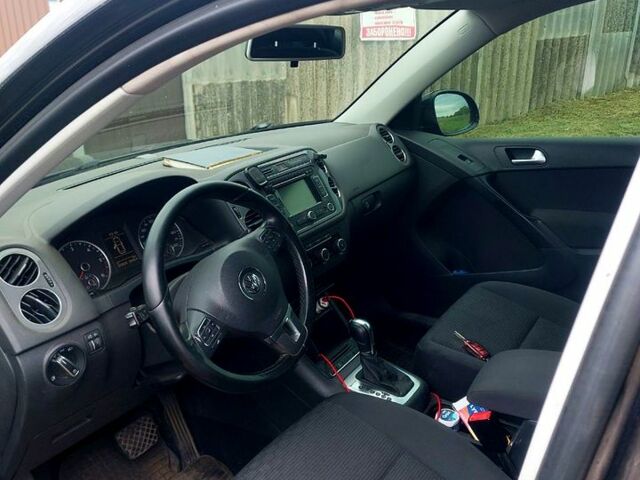 Черный Фольксваген Тигуан, объемом двигателя 2 л и пробегом 340 тыс. км за 14500 $, фото 2 на Automoto.ua