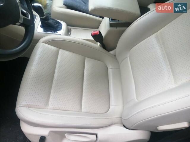 Чорний Фольксваген Тігуан, об'ємом двигуна 2 л та пробігом 99 тис. км за 15000 $, фото 5 на Automoto.ua