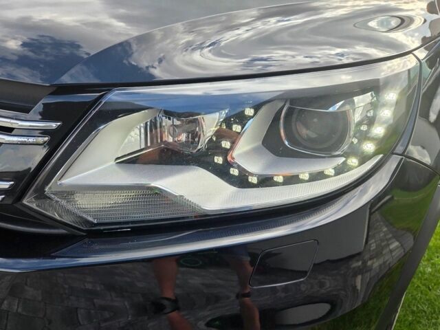 Черный Фольксваген Тигуан, объемом двигателя 1.4 л и пробегом 170 тыс. км за 8650 $, фото 4 на Automoto.ua