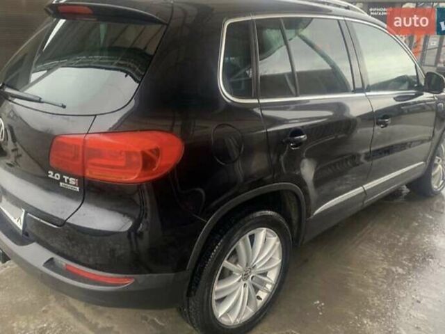 Чорний Фольксваген Тігуан, об'ємом двигуна 1.98 л та пробігом 180 тис. км за 14000 $, фото 22 на Automoto.ua
