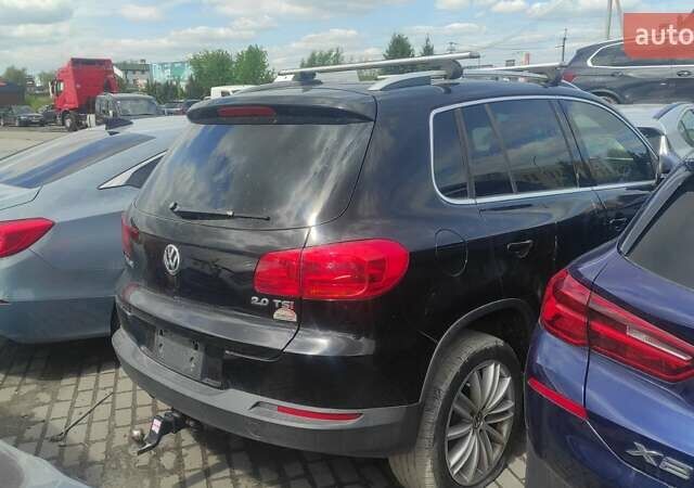 Чорний Фольксваген Тігуан, об'ємом двигуна 2 л та пробігом 210 тис. км за 7800 $, фото 3 на Automoto.ua