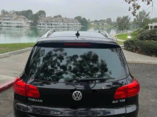 Черный Фольксваген Тигуан, объемом двигателя 2 л и пробегом 84 тыс. км за 2200 $, фото 5 на Automoto.ua