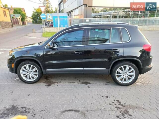 Чорний Фольксваген Тігуан, об'ємом двигуна 1.98 л та пробігом 246 тис. км за 12500 $, фото 1 на Automoto.ua