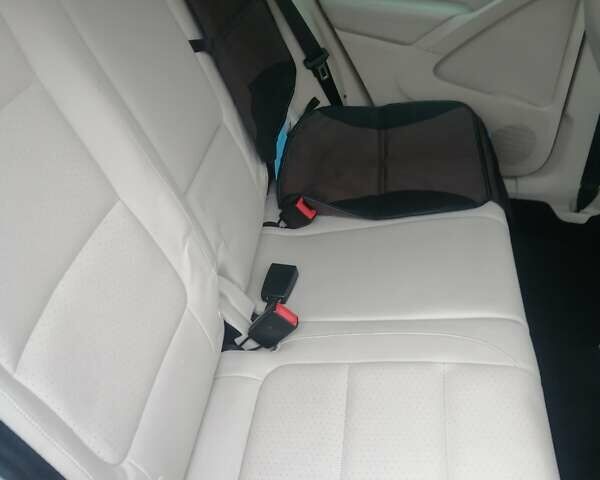 Чорний Фольксваген Тігуан, об'ємом двигуна 2 л та пробігом 99 тис. км за 15000 $, фото 15 на Automoto.ua