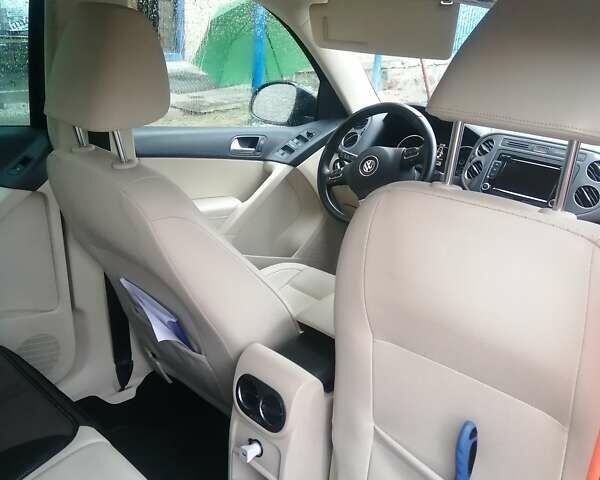 Чорний Фольксваген Тігуан, об'ємом двигуна 2 л та пробігом 99 тис. км за 15000 $, фото 14 на Automoto.ua