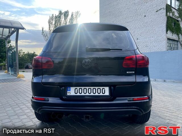 Черный Фольксваген Тигуан, объемом двигателя 2 л и пробегом 246 тыс. км за 9000 $, фото 3 на Automoto.ua