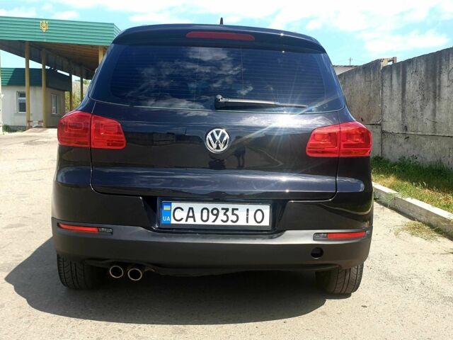 Черный Фольксваген Тигуан, объемом двигателя 2 л и пробегом 200 тыс. км за 11700 $, фото 3 на Automoto.ua