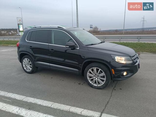 Черный Фольксваген Тигуан, объемом двигателя 2 л и пробегом 172 тыс. км за 12000 $, фото 1 на Automoto.ua