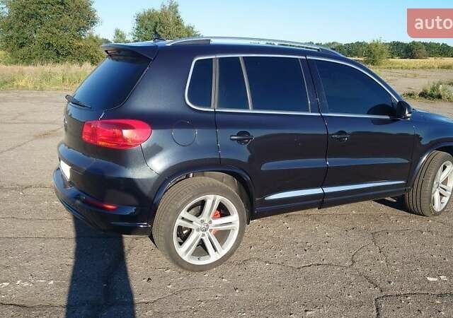 Черный Фольксваген Тигуан, объемом двигателя 2 л и пробегом 126 тыс. км за 14250 $, фото 1 на Automoto.ua