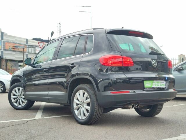 Чорний Фольксваген Тігуан, об'ємом двигуна 2 л та пробігом 150 тис. км за 18799 $, фото 4 на Automoto.ua