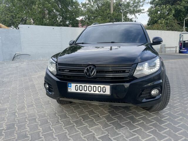 Черный Фольксваген Тигуан, объемом двигателя 2 л и пробегом 246 тыс. км за 9000 $, фото 1 на Automoto.ua