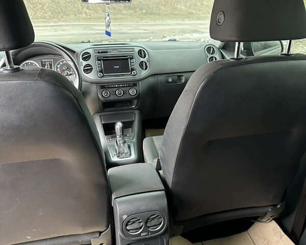 Черный Фольксваген Тигуан, объемом двигателя 2 л и пробегом 181 тыс. км за 11350 $, фото 3 на Automoto.ua