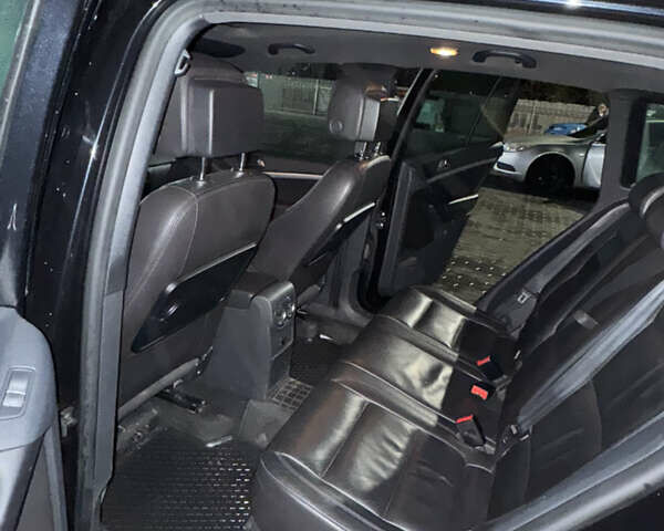 Чорний Фольксваген Тігуан, об'ємом двигуна 2 л та пробігом 291 тис. км за 17000 $, фото 7 на Automoto.ua