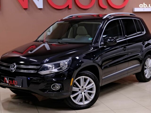 Черный Фольксваген Тигуан, объемом двигателя 2 л и пробегом 195 тыс. км за 11900 $, фото 1 на Automoto.ua