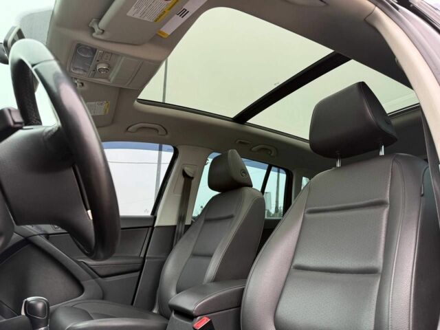 Чорний Фольксваген Тігуан, об'ємом двигуна 2 л та пробігом 145 тис. км за 12650 $, фото 20 на Automoto.ua