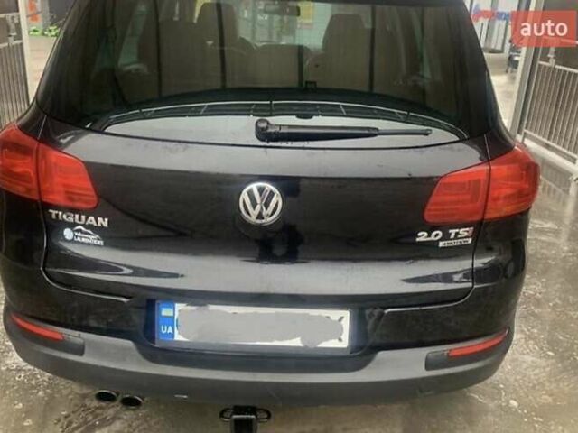 Чорний Фольксваген Тігуан, об'ємом двигуна 1.98 л та пробігом 180 тис. км за 14000 $, фото 19 на Automoto.ua