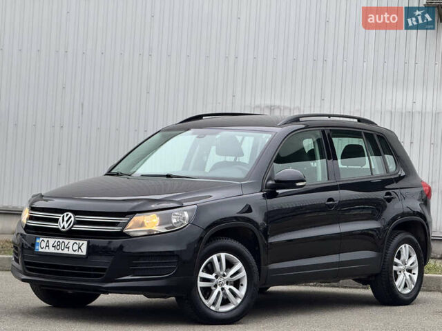 Черный Фольксваген Тигуан, объемом двигателя 1.98 л и пробегом 180 тыс. км за 11800 $, фото 1 на Automoto.ua