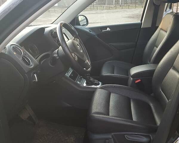 Чорний Фольксваген Тігуан, об'ємом двигуна 1.98 л та пробігом 128 тис. км за 14500 $, фото 12 на Automoto.ua