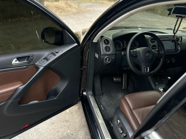 Чорний Фольксваген Тігуан, об'ємом двигуна 2 л та пробігом 97 тис. км за 20500 $, фото 5 на Automoto.ua