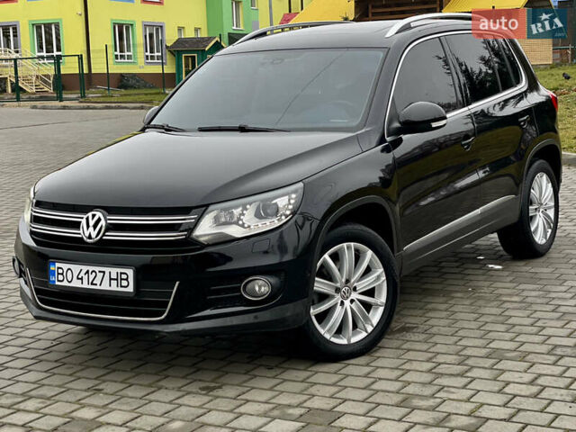 Чорний Фольксваген Тігуан, об'ємом двигуна 2 л та пробігом 223 тис. км за 16950 $, фото 2 на Automoto.ua