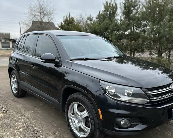 Черный Фольксваген Тигуан, объемом двигателя 1.98 л и пробегом 180 тыс. км за 12800 $, фото 1 на Automoto.ua