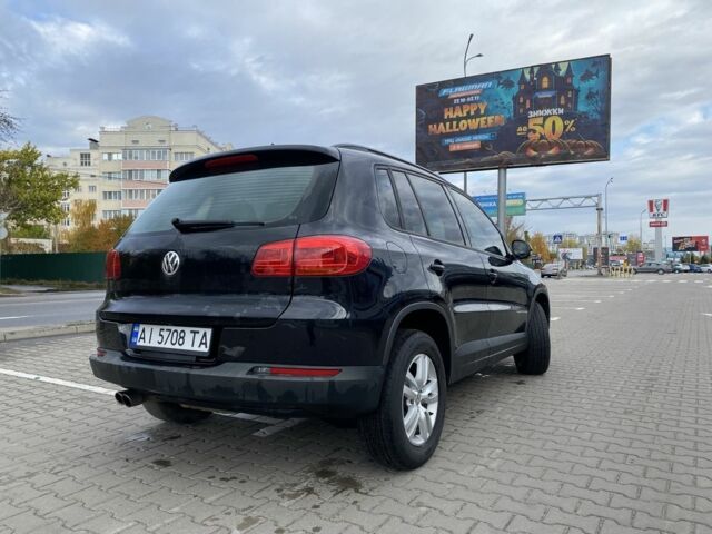 Черный Фольксваген Тигуан, объемом двигателя 2 л и пробегом 178 тыс. км за 12500 $, фото 2 на Automoto.ua