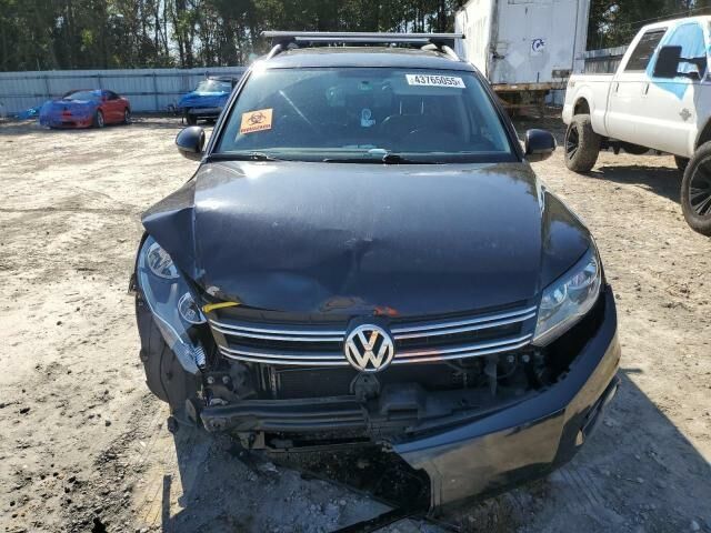 Черный Фольксваген Тигуан, объемом двигателя 2 л и пробегом 206 тыс. км за 7700 $, фото 1 на Automoto.ua