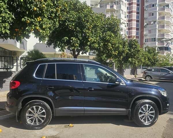 Черный Фольксваген Тигуан, объемом двигателя 2 л и пробегом 201 тыс. км за 14000 $, фото 2 на Automoto.ua