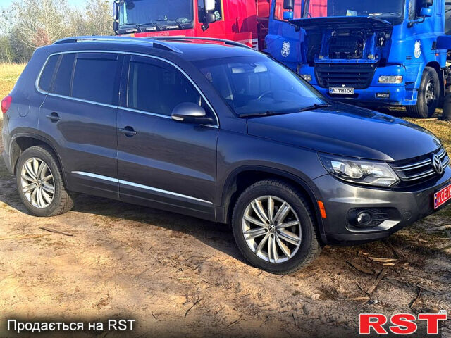 Чорний Фольксваген Тігуан, об'ємом двигуна 2 л та пробігом 287 тис. км за 12500 $, фото 3 на Automoto.ua