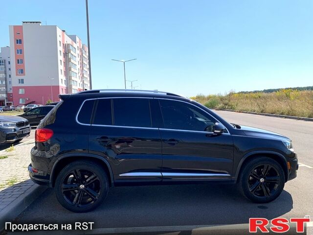 Черный Фольксваген Тигуан, объемом двигателя 2 л и пробегом 230 тыс. км за 12000 $, фото 4 на Automoto.ua