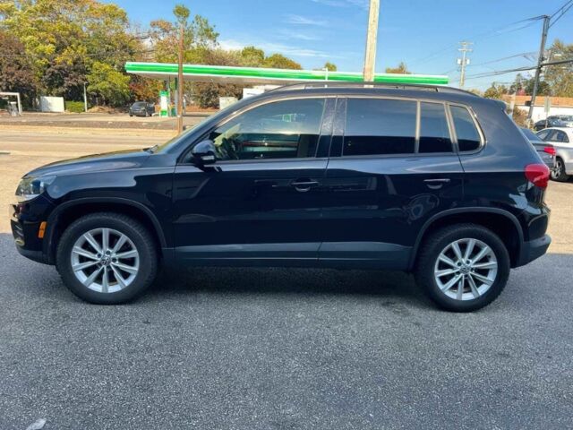 Чорний Фольксваген Тігуан, об'ємом двигуна 2 л та пробігом 74 тис. км за 4800 $, фото 3 на Automoto.ua