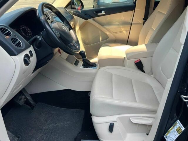 Чорний Фольксваген Тігуан, об'ємом двигуна 2 л та пробігом 74 тис. км за 4800 $, фото 10 на Automoto.ua