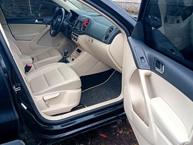 Чорний Фольксваген Тігуан, об'ємом двигуна 2 л та пробігом 145 тис. км за 11500 $, фото 11 на Automoto.ua