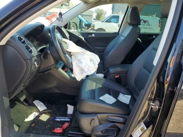 Черный Фольксваген Тигуан, объемом двигателя 2 л и пробегом 206 тыс. км за 7700 $, фото 6 на Automoto.ua