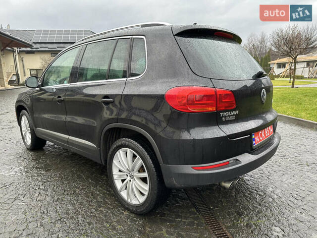 Черный Фольксваген Тигуан, объемом двигателя 1.98 л и пробегом 143 тыс. км за 12400 $, фото 5 на Automoto.ua