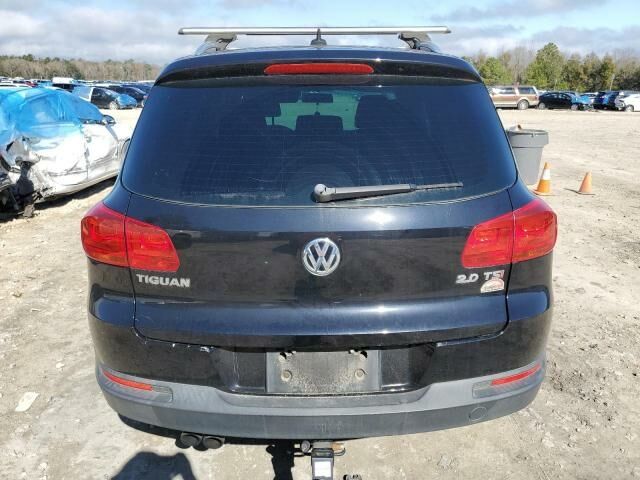Черный Фольксваген Тигуан, объемом двигателя 2 л и пробегом 206 тыс. км за 7700 $, фото 4 на Automoto.ua
