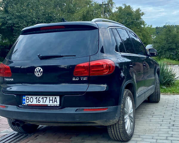 Черный Фольксваген Тигуан, объемом двигателя 1.98 л и пробегом 155 тыс. км за 12800 $, фото 2 на Automoto.ua