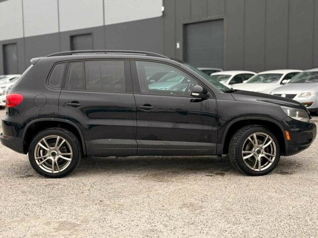 Черный Фольксваген Тигуан, объемом двигателя 2 л и пробегом 153 тыс. км за 10940 $, фото 4 на Automoto.ua