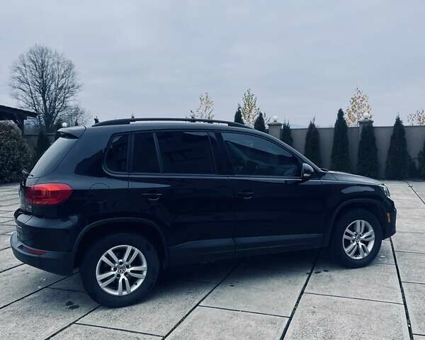 Чорний Фольксваген Тігуан, об'ємом двигуна 1.98 л та пробігом 148 тис. км за 12600 $, фото 2 на Automoto.ua