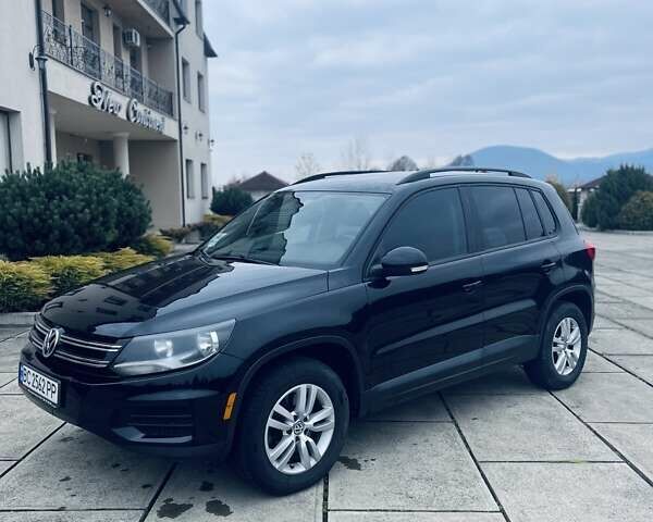 Чорний Фольксваген Тігуан, об'ємом двигуна 1.98 л та пробігом 148 тис. км за 12600 $, фото 1 на Automoto.ua