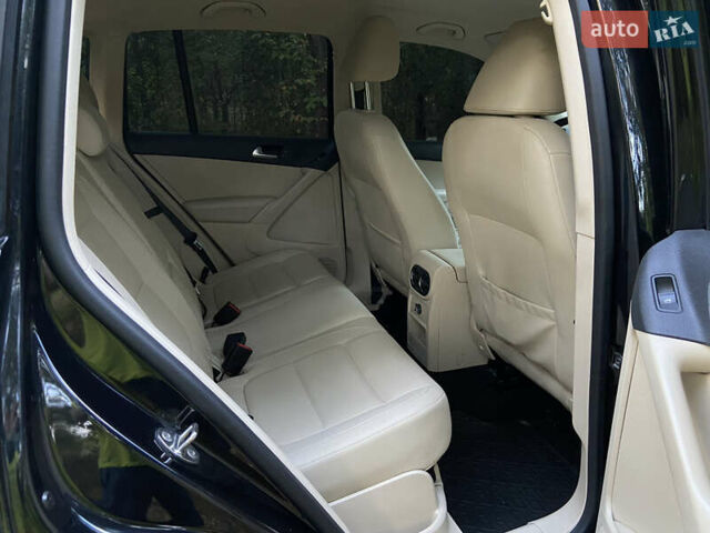 Черный Фольксваген Тигуан, объемом двигателя 1.98 л и пробегом 99 тыс. км за 16000 $, фото 1 на Automoto.ua