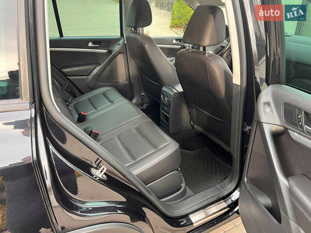 Чорний Фольксваген Тігуан, об'ємом двигуна 1.98 л та пробігом 174 тис. км за 12750 $, фото 64 на Automoto.ua
